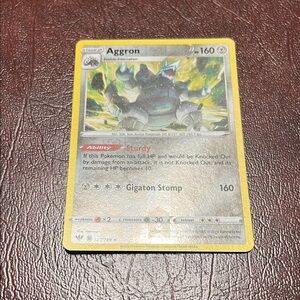 Aggron Pokémon Card with Yellow Border
